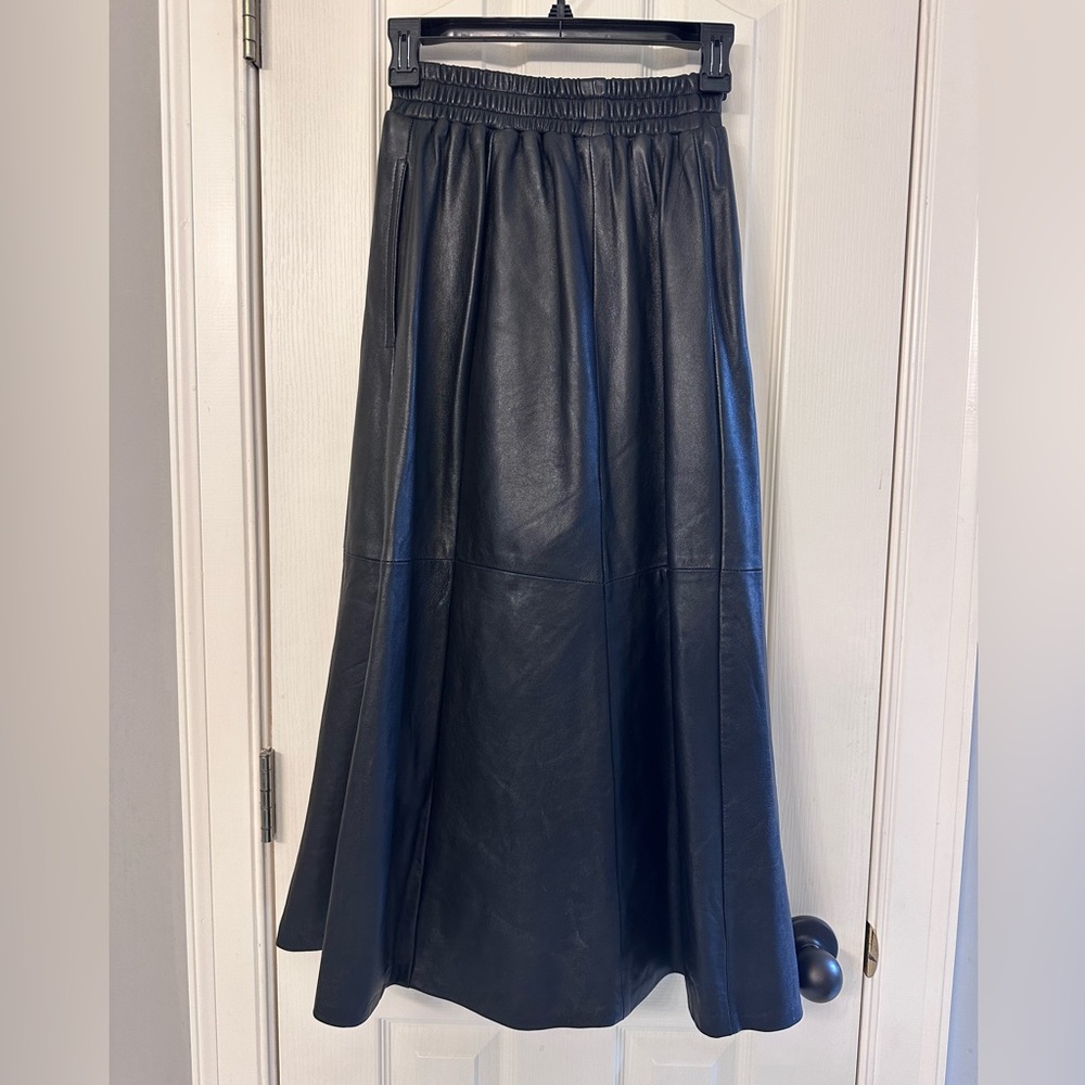 Black leather a line midi skirt made exclusively for Saks Fifth Avenue size S.